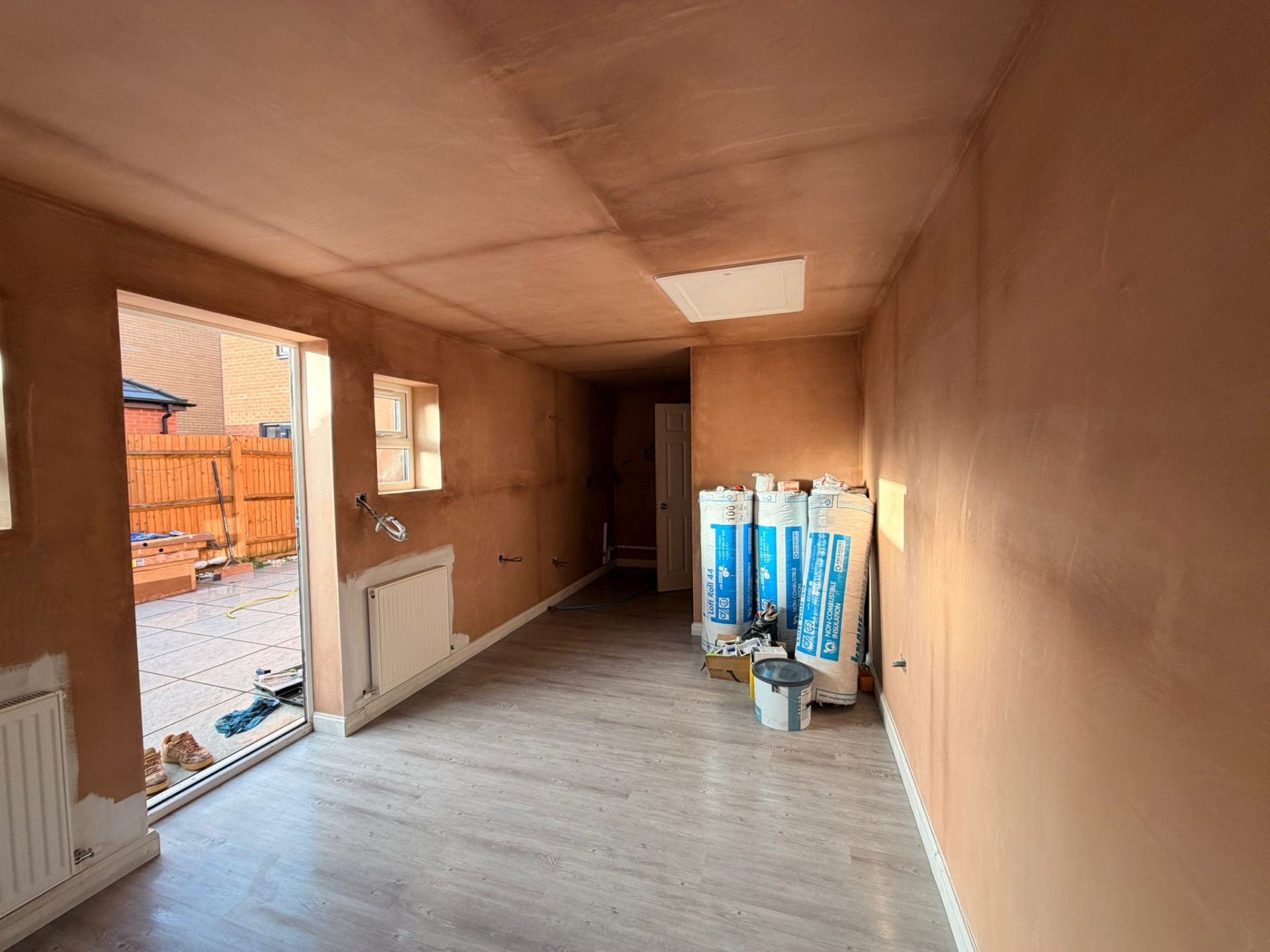Open-plan room before painting and finishing