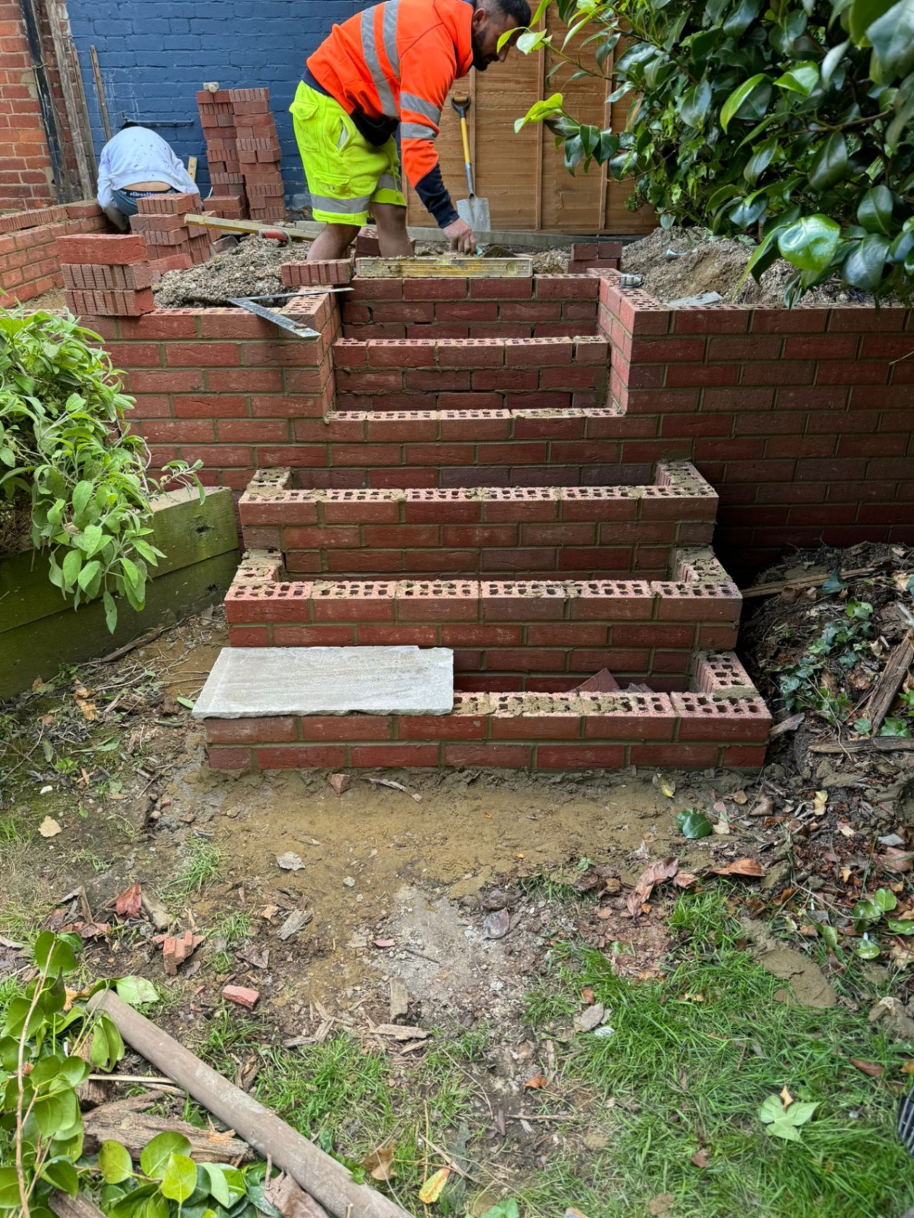 Garden brickwork steps mid-construction