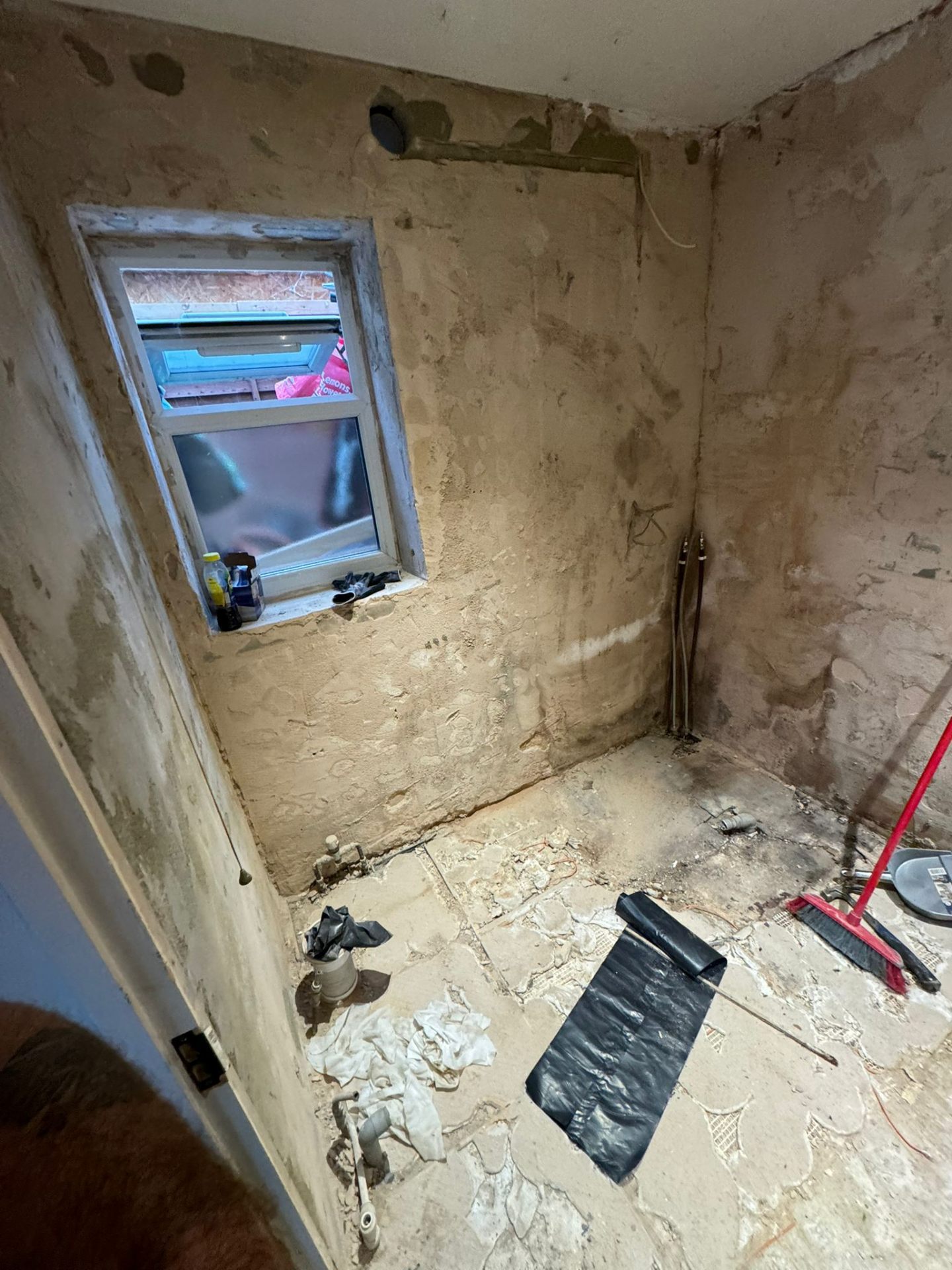 Walls re-prepped and plumbing first-fix in progress